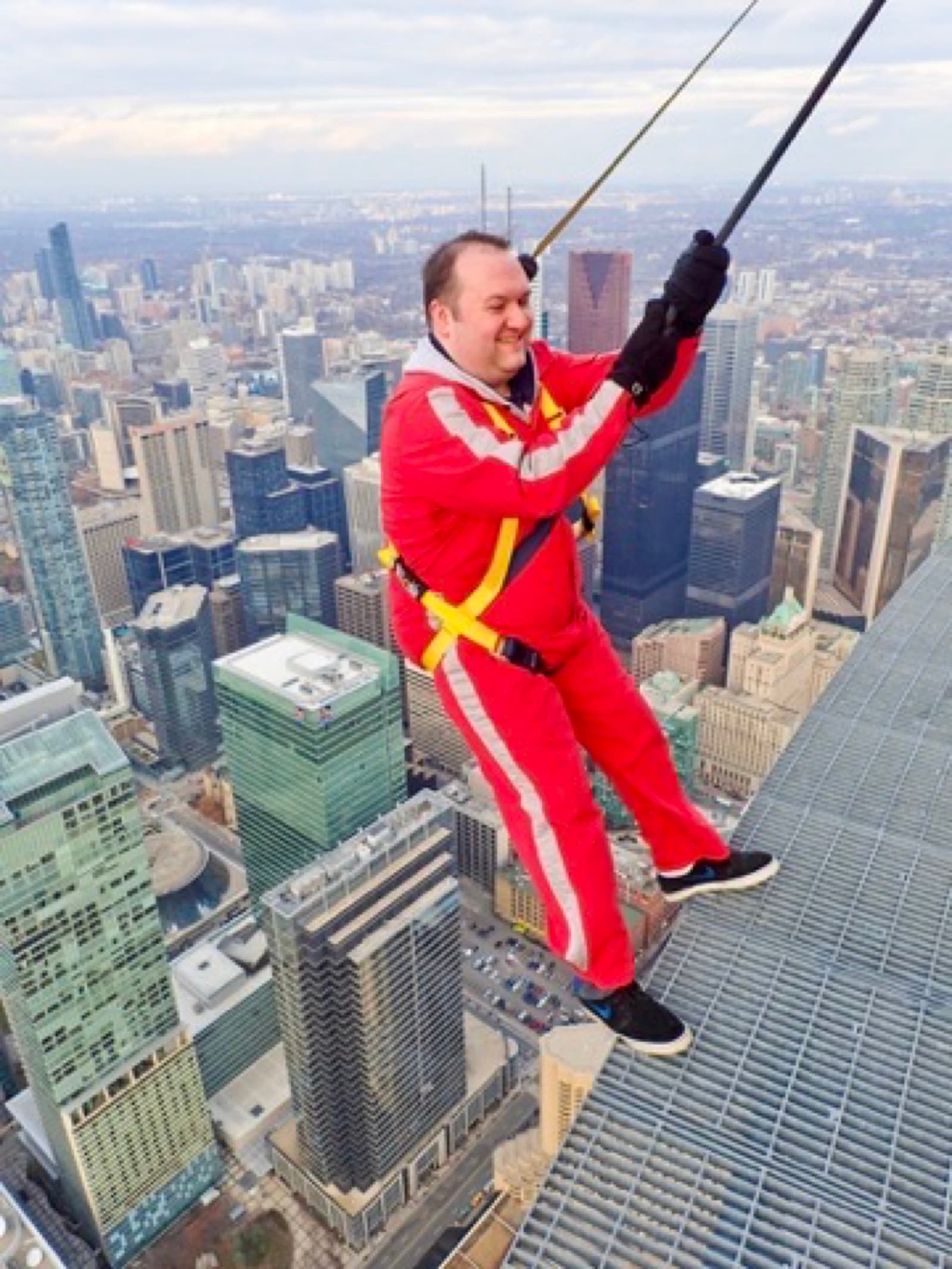 CN Tower EdgeWalk, leaning out over downtown Toronto