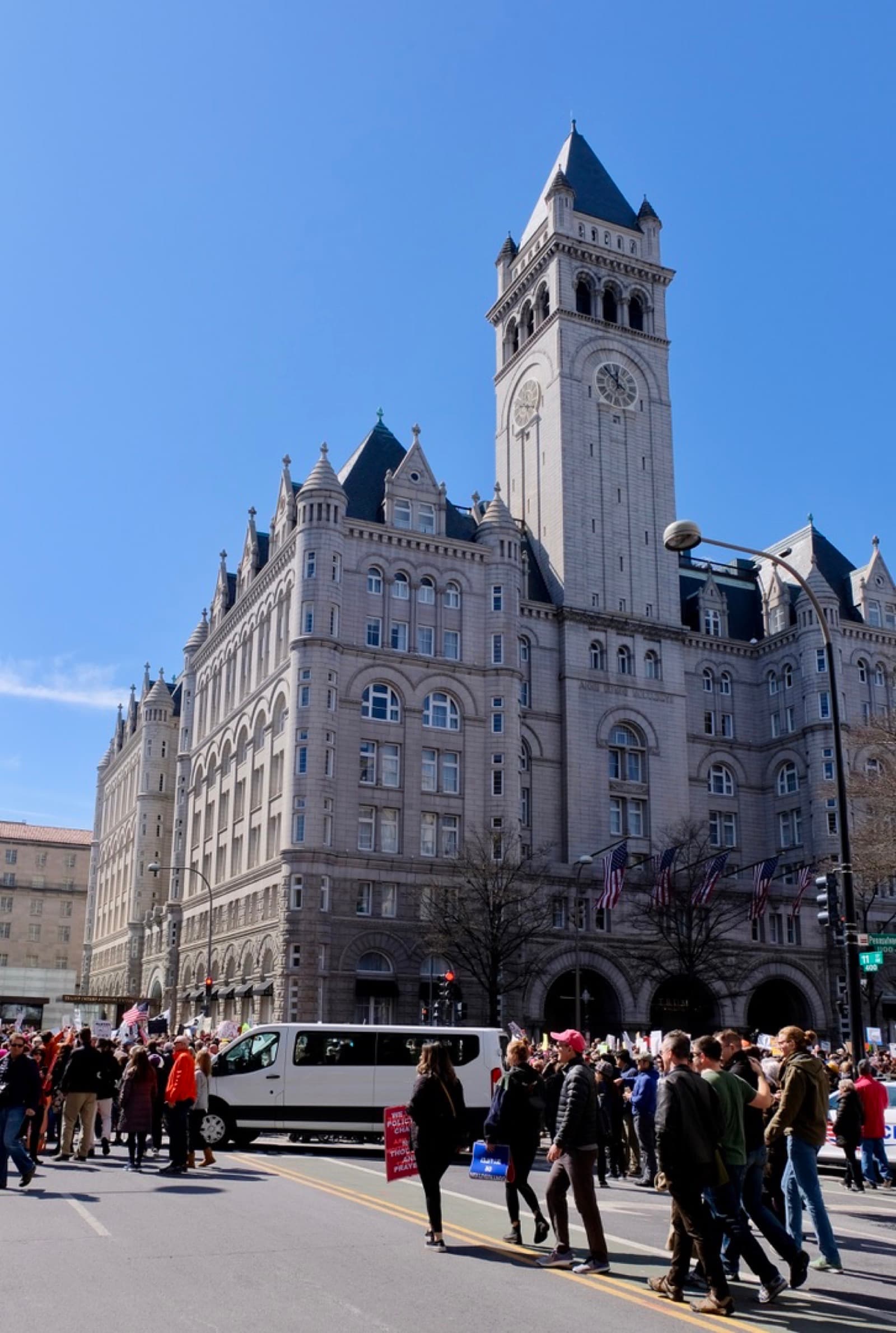 Marchers passing the Old Post Office on Pennsylvania Avenue