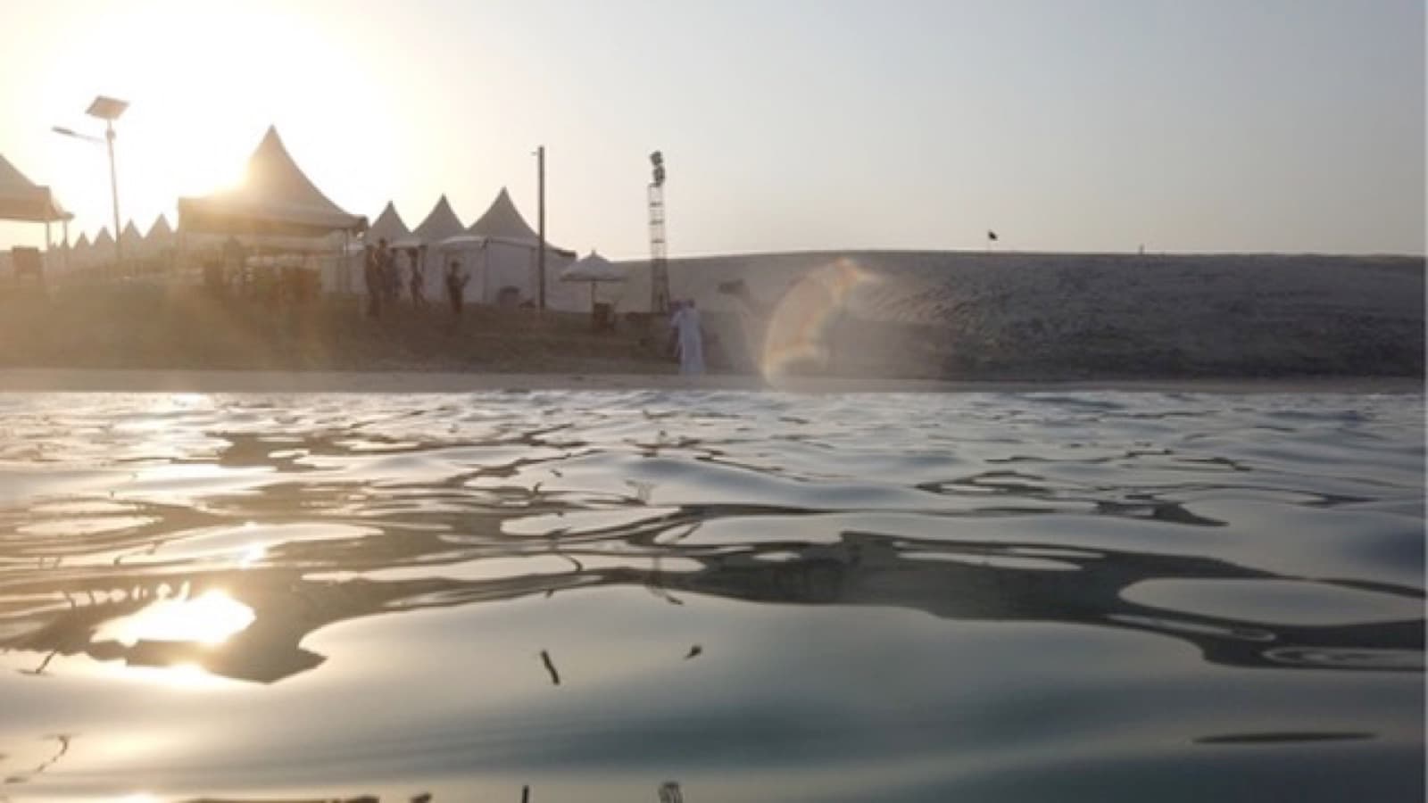 Qatar desert camp at sunset