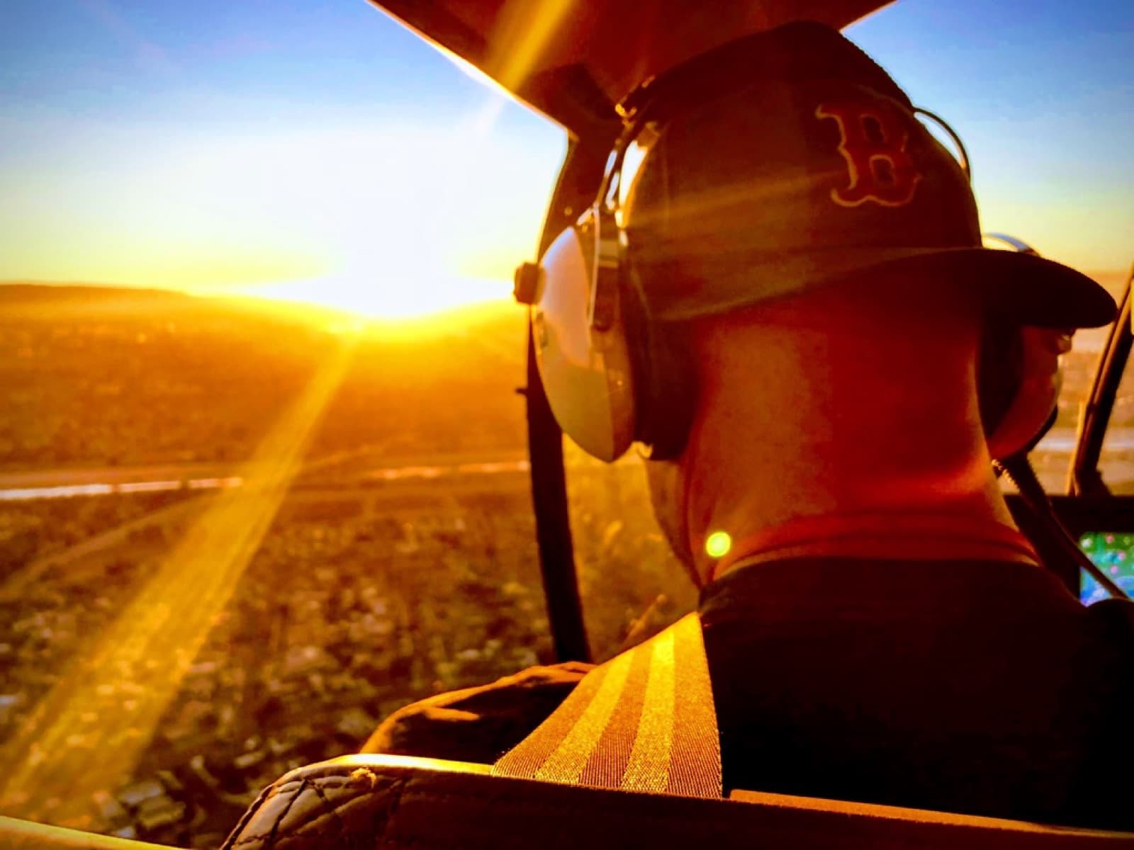 Pilot at sunset, Anthelion Helicopters