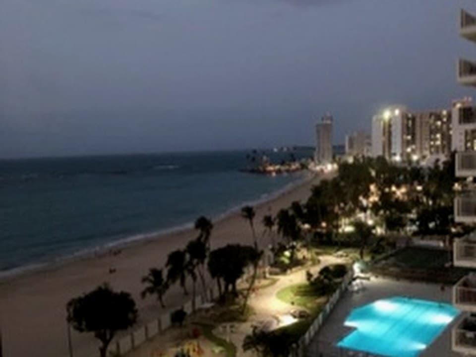 San Juan beach at dusk from the hotel balcony